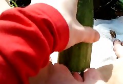 chubby mature masturbates with giant cucumber